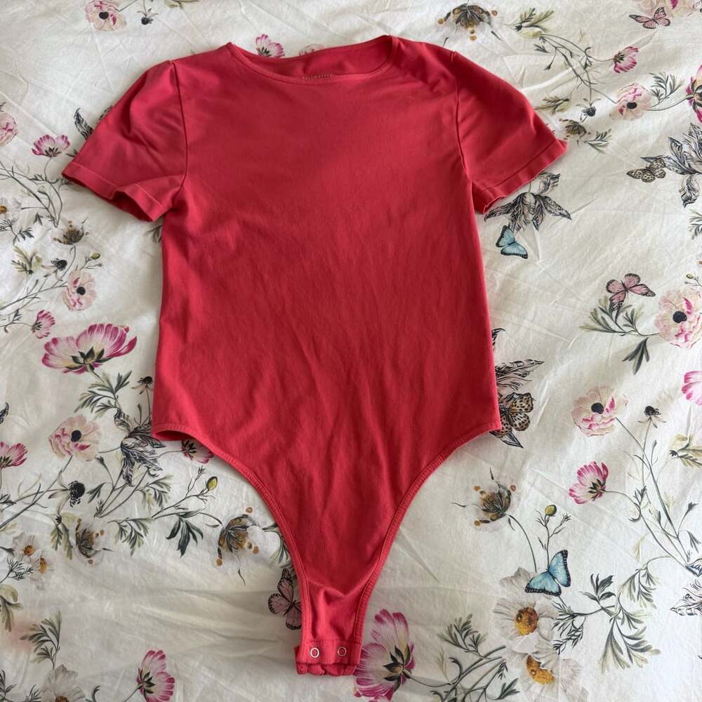 Free People Bodysuit Size M/L Red Short Sleeve Round Neck Nylon Blend